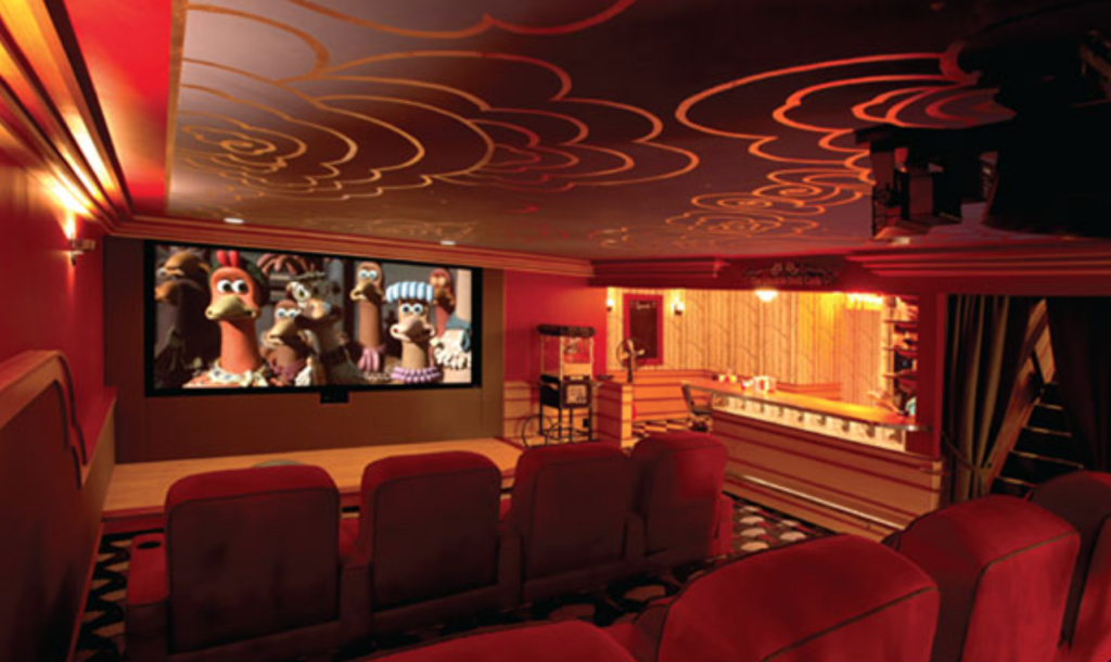 standout-inviting-red-and-gold-home-theater-theme-honoring-Hollywoods-golden-age-of-film